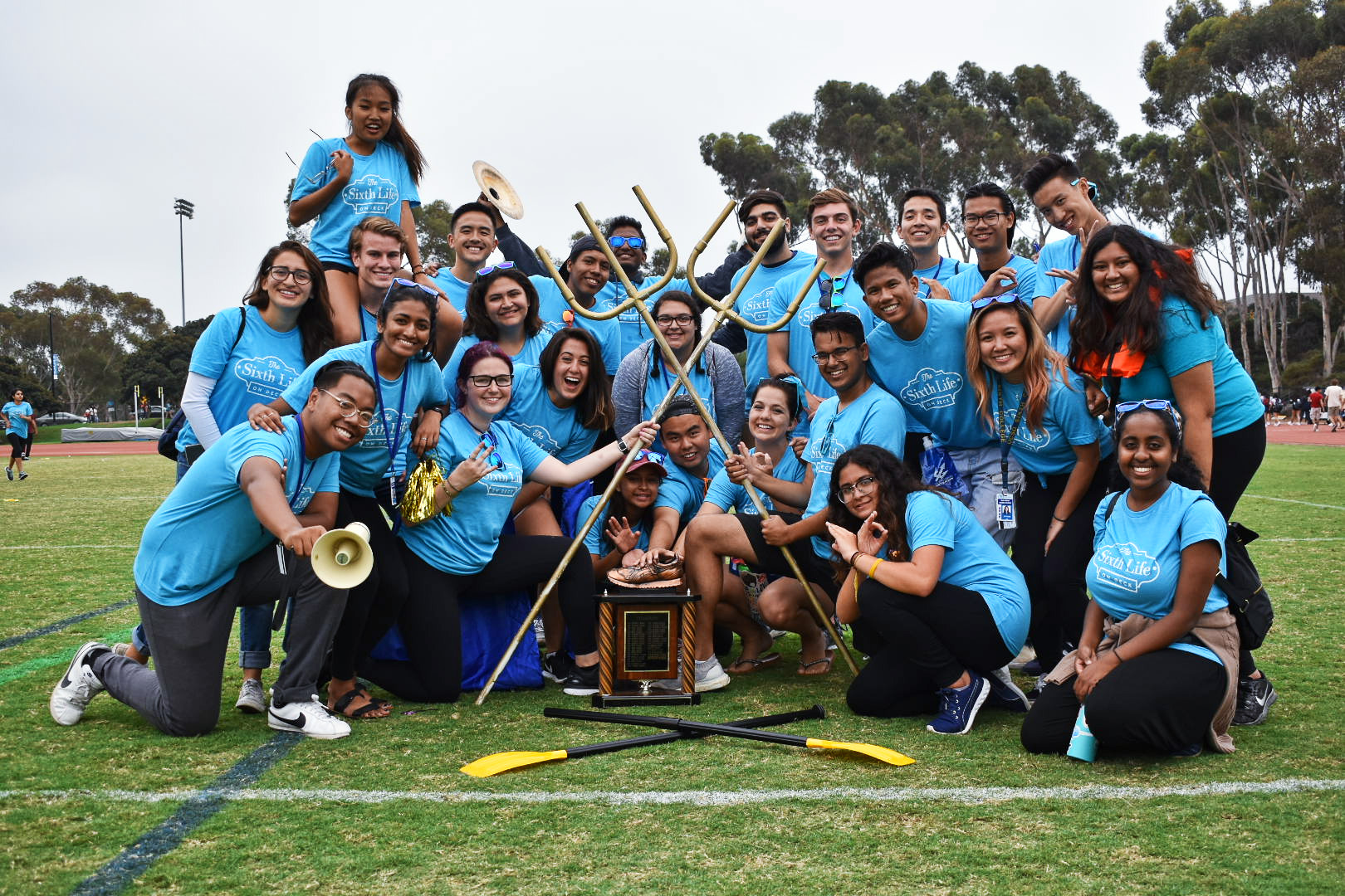 Sixth College students pose for a picture after winning the UnOlympics trophy.