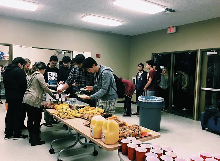 Students in line getting breakfast