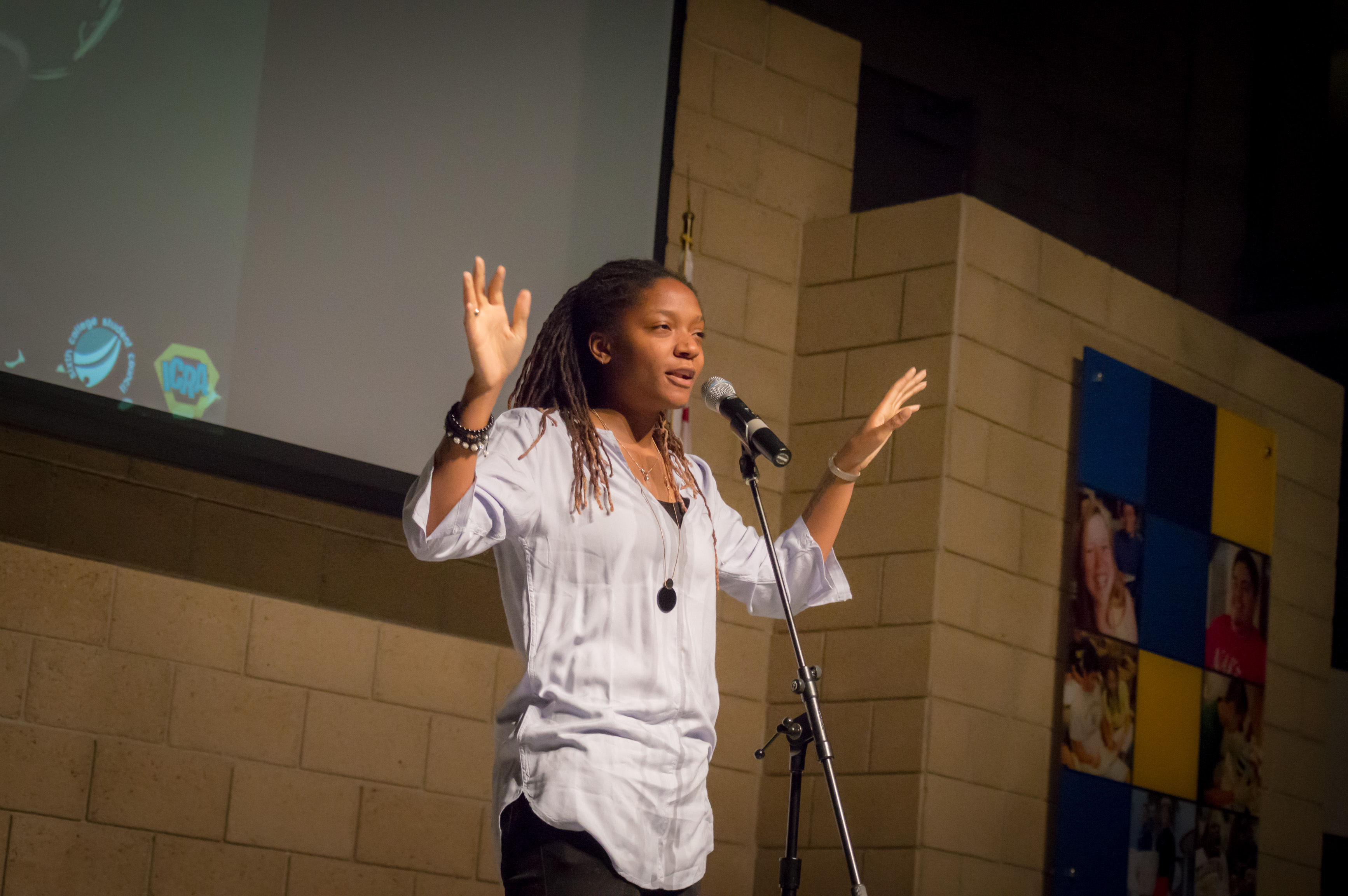 Woman on stage speaking