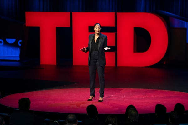 Woman speaking at a Ted Talk